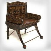 Кресло Котьера в египетском стиле с резьбой на внешних и внутренних поверхностях и стяжками-подставками